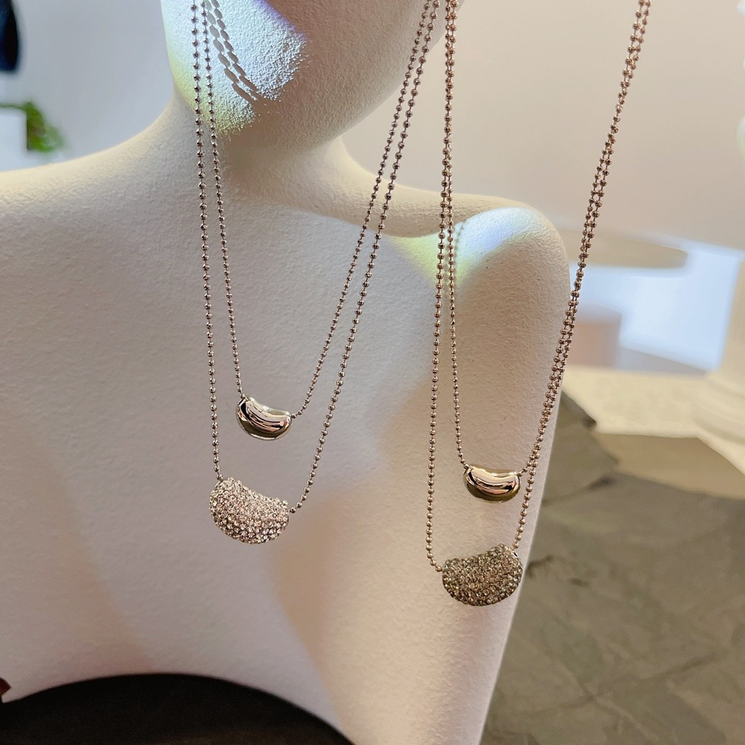 Nova Gleam – Layered Silver Moon Necklace