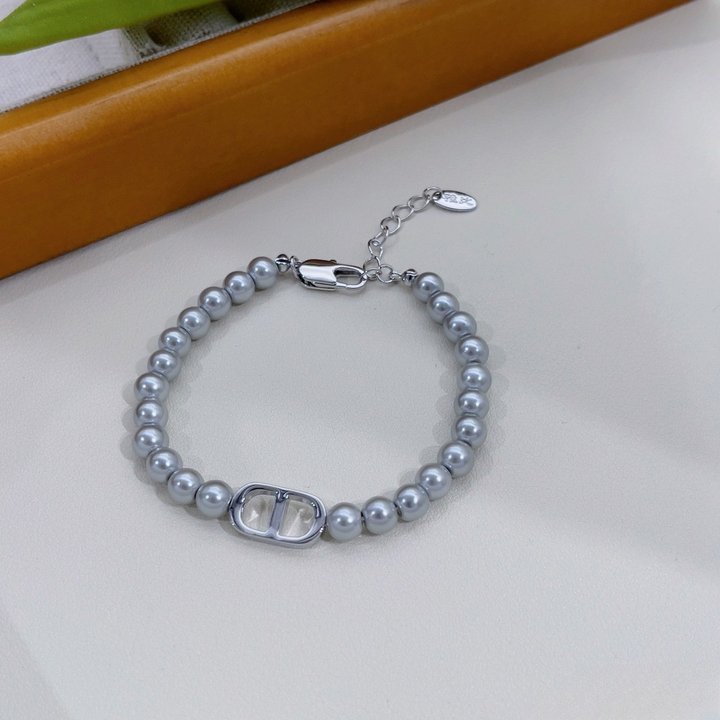 Elegant Silver Pearl Bracelet with Designer Oval Charm