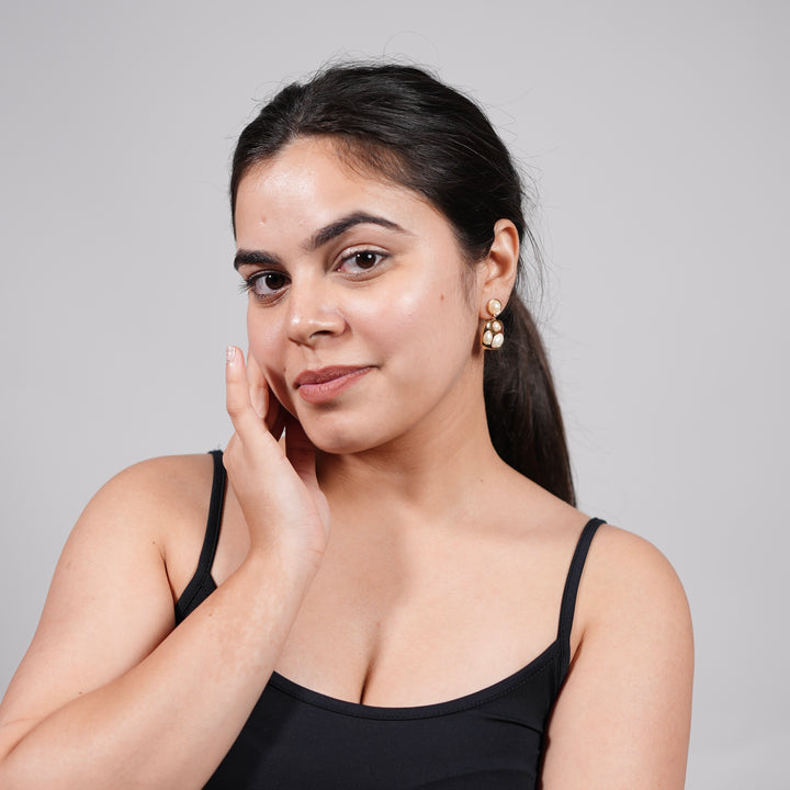 Molten Pearl Art Earrings – Sculpted Gold Drop Studs