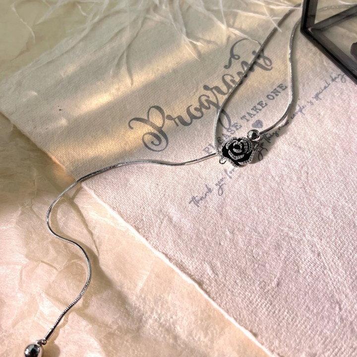 Elegant Adjustable Black Rose Lariat Necklace – Gold & Silver