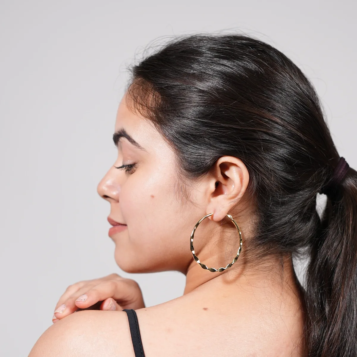 Bhavya wearing Wave Texture Hoop Earrings